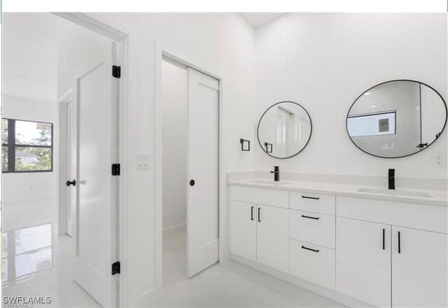 2815 32nd St W, Lehigh Acres, FL 33971 - full bath featuring double vanity