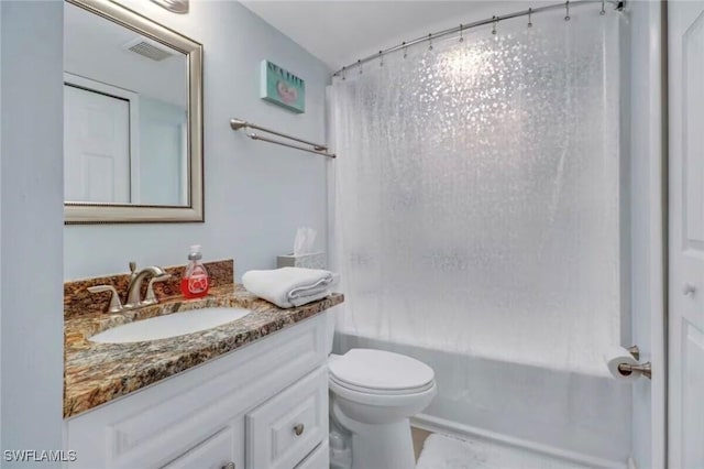 260 Southbay Dr Unit 103, Naples, FL 34108 - bathroom featuring vanity, shower / bath combo, and toilet