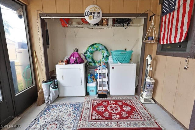 washroom with separate washer and dryer