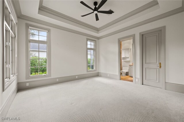 6387 Highcroft Dr, Naples, FL 34119 - unfurnished room featuring ornamental molding, plenty of natural light, carpet floors, and a raised ceiling