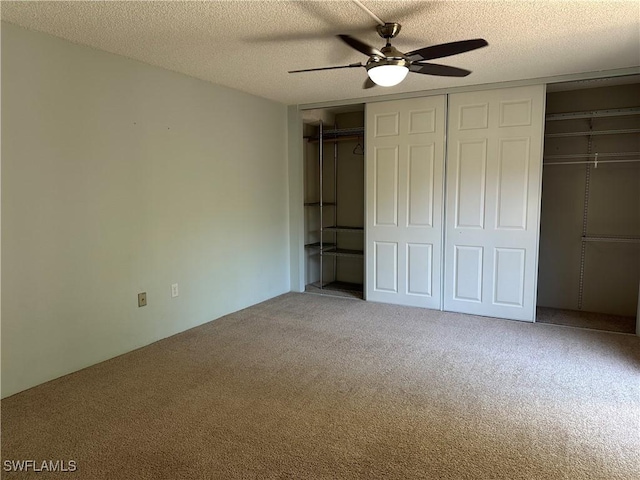 5226 Cedarbend Dr Unit 2, Fort Myers, FL 33919 - unfurnished bedroom with carpet, a textured ceiling, and ceiling fan