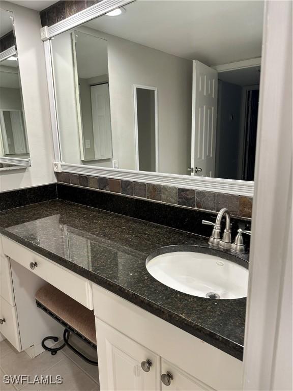 5226 Cedarbend Dr Unit 2, Fort Myers, FL 33919 - bathroom with vanity and tile patterned flooring
