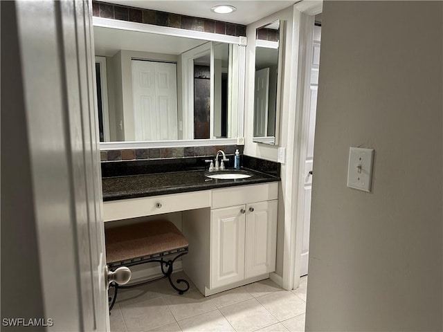 5226 Cedarbend Dr Unit 2, Fort Myers, FL 33919 - bathroom with tile patterned flooring and vanity