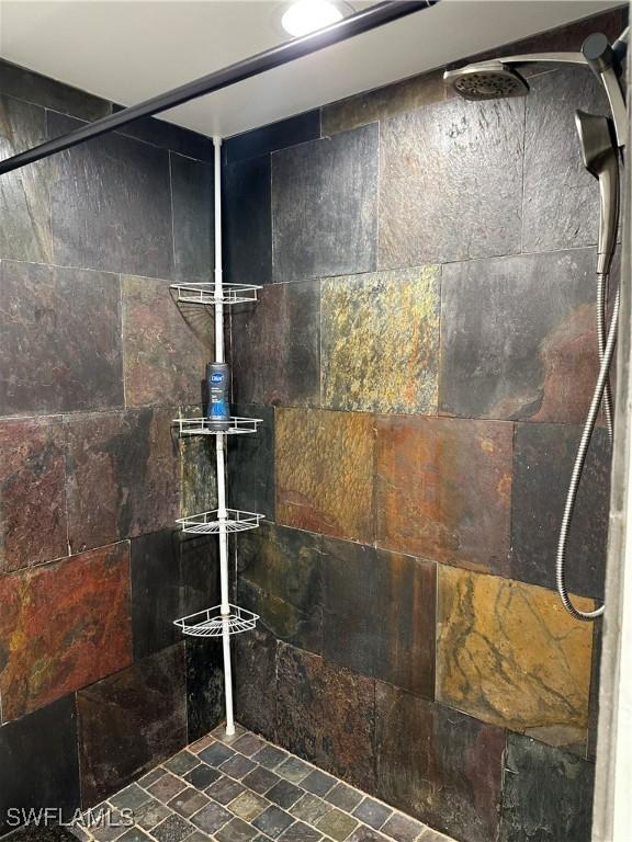 5226 Cedarbend Dr Unit 2, Fort Myers, FL 33919 - full bathroom featuring tiled shower