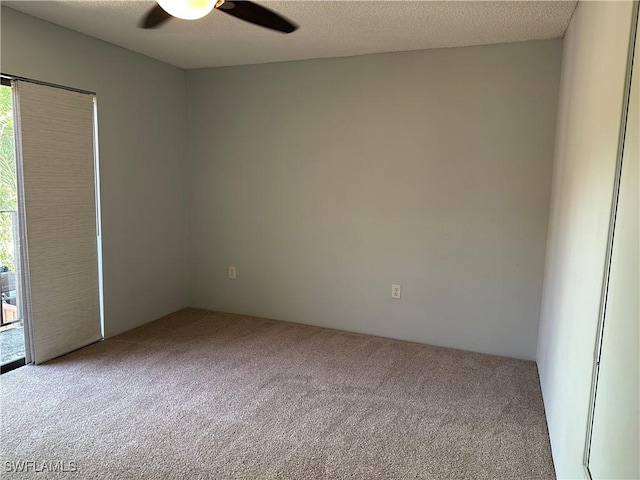 5226 Cedarbend Dr Unit 2, Fort Myers, FL 33919 - carpeted spare room with a ceiling fan