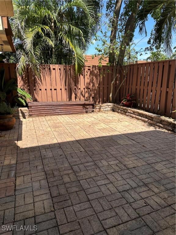5226 Cedarbend Dr Unit 2, Fort Myers, FL 33919 - fenced backyard featuring a patio