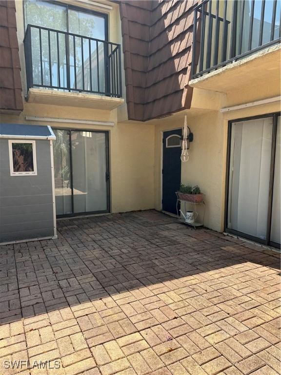 5226 Cedarbend Dr Unit 2, Fort Myers, FL 33919 - view of patio / terrace with a balcony
