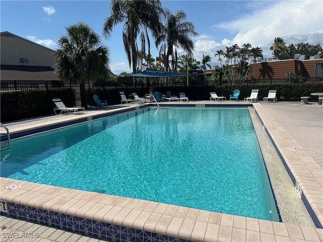 5226 Cedarbend Dr Unit 2, Fort Myers, FL 33919 - community pool with a patio area
