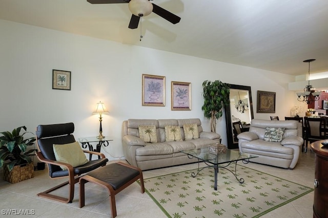 2386 Magnolia Ave Unit 7801, Naples, FL 34112 - tiled living room with a ceiling fan and a chandelier