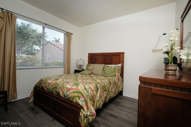 2386 Magnolia Ave Unit 7801, Naples, FL 34112 - bedroom with wood finished floors and baseboards