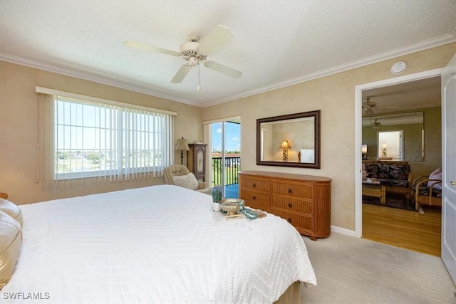 21 High Point Cir E Unit 502, Naples, FL 34103 - bedroom with access to outside, crown molding, light colored carpet, ceiling fan, and baseboards