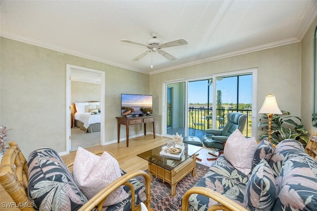 21 High Point Cir E Unit 502, Naples, FL 34103 - living area with light wood-type flooring, a ceiling fan, and ornamental molding