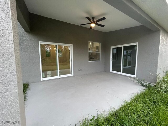 view of patio with ceiling fan