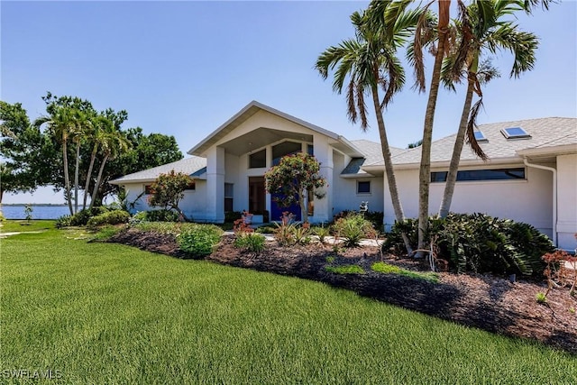12439 Prather Ave, Port Charlotte, FL 33981 - view of front of house with a front lawn and stucco siding
