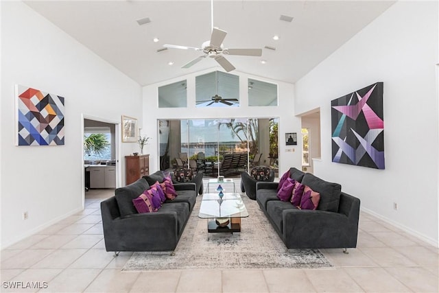12439 Prather Ave, Port Charlotte, FL 33981 - living room with light tile patterned floors, high vaulted ceiling, a ceiling fan, baseboards, and recessed lighting