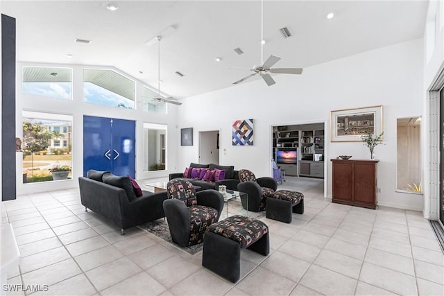 12439 Prather Ave, Port Charlotte, FL 33981 - living area featuring high vaulted ceiling, light tile patterned flooring, and a ceiling fan