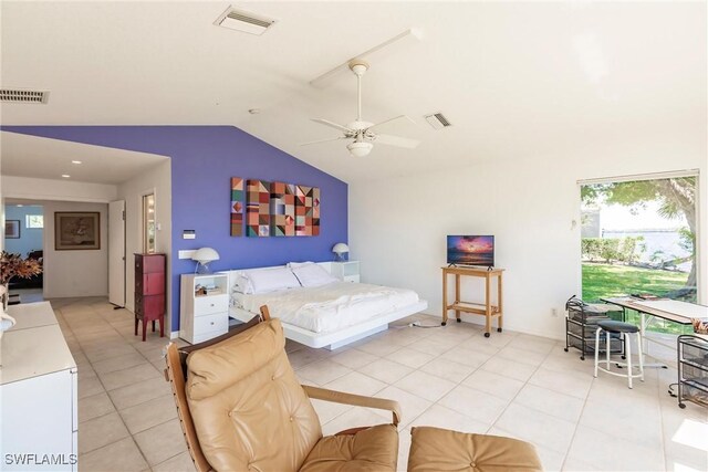 12439 Prather Ave, Port Charlotte, FL 33981 - bedroom featuring lofted ceiling, light tile patterned floors, and ceiling fan