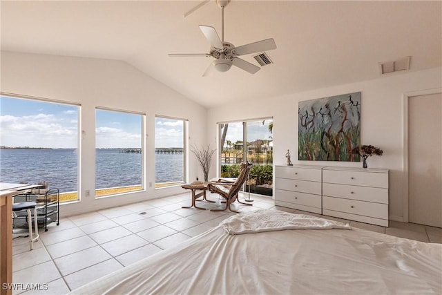 12439 Prather Ave, Port Charlotte, FL 33981 - tiled bedroom with lofted ceiling, access to exterior, a water view, and a ceiling fan