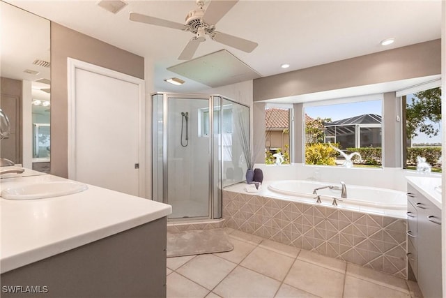 12439 Prather Ave, Port Charlotte, FL 33981 - bathroom featuring tile patterned flooring, plenty of natural light, a stall shower, and vanity