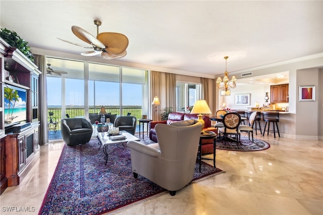 4761 W Bay Blvd Unit 803, Estero, FL 33928 - living area with a chandelier, ornamental molding, light marble finish flooring, baseboards, and a ceiling fan