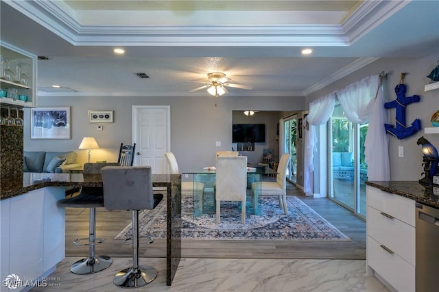 1303 Thompson St, North Fort Myers, FL 33903 - dining area with crown molding, recessed lighting, and a ceiling fan