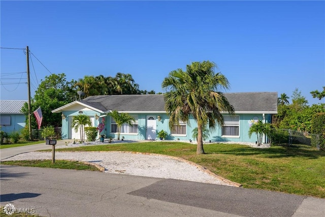 1303 Thompson St, North Fort Myers, FL 33903 - single story home featuring driveway