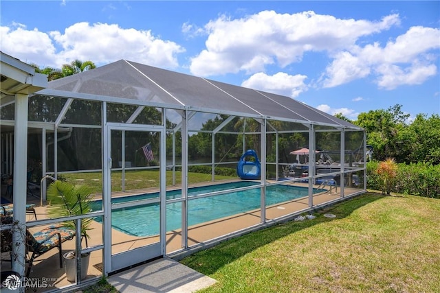 1303 Thompson St, North Fort Myers, FL 33903 - swimming pool with a yard and a lanai