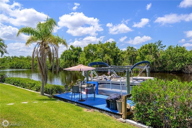 1303 Thompson St, North Fort Myers, FL 33903 - dock area with a water view, a yard, and boat lift