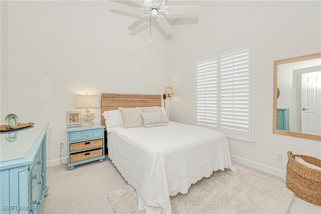 28839 Winthrop Cir, Bonita Springs, FL 34134 - bedroom featuring baseboards, a ceiling fan, and light carpet