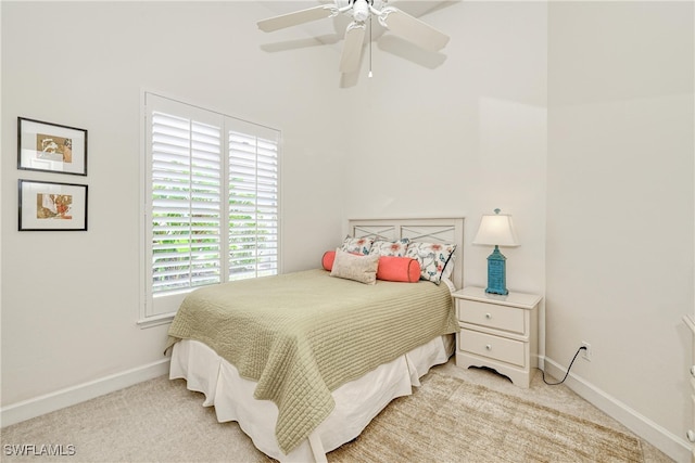 28839 Winthrop Cir, Bonita Springs, FL 34134 - bedroom featuring light carpet, baseboards, and a ceiling fan