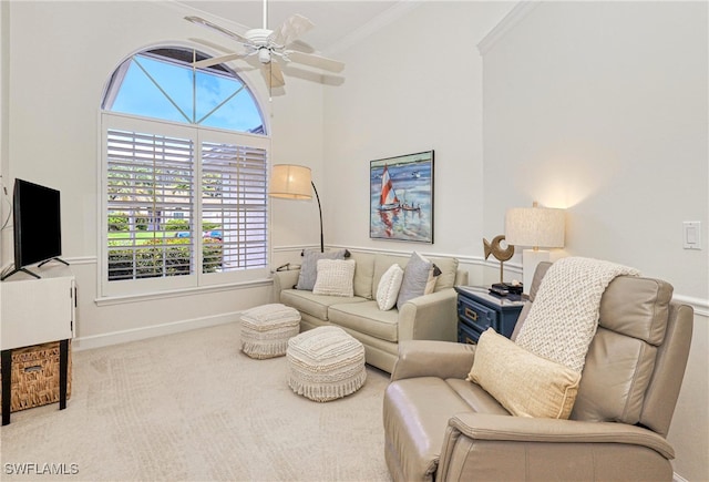 28839 Winthrop Cir, Bonita Springs, FL 34134 - carpeted living area with healthy amount of natural light, ceiling fan, vaulted ceiling, baseboards, and crown molding