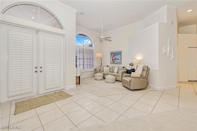 28839 Winthrop Cir, Bonita Springs, FL 34134 - tiled foyer entrance with crown molding, a ceiling fan, baseboards, carpet flooring, and recessed lighting