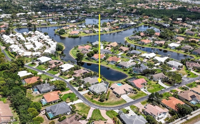 28839 Winthrop Cir, Bonita Springs, FL 34134 - aerial view of property's location with nearby suburban area and a large body of water