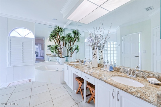 28839 Winthrop Cir, Bonita Springs, FL 34134 - bathroom featuring ornamental molding, tile patterned floors, a bath, plenty of natural light, and double vanity