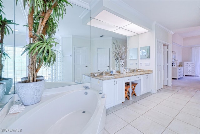 28839 Winthrop Cir, Bonita Springs, FL 34134 - bathroom featuring a bath, tile patterned floors, double vanity, and crown molding