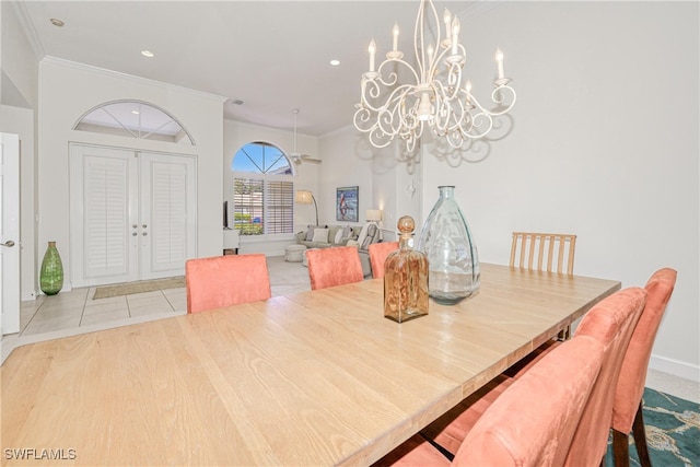 28839 Winthrop Cir, Bonita Springs, FL 34134 - tiled dining space with a chandelier, ornamental molding, baseboards, and recessed lighting
