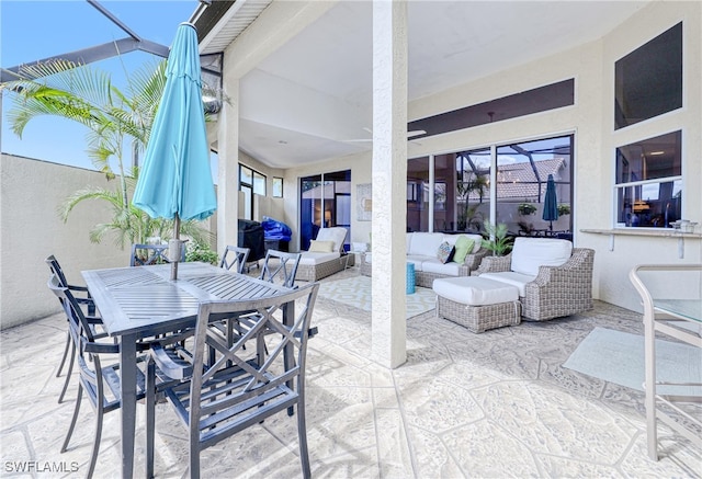 28839 Winthrop Cir, Bonita Springs, FL 34134 - view of patio / terrace with an outdoor living space and outdoor dining area