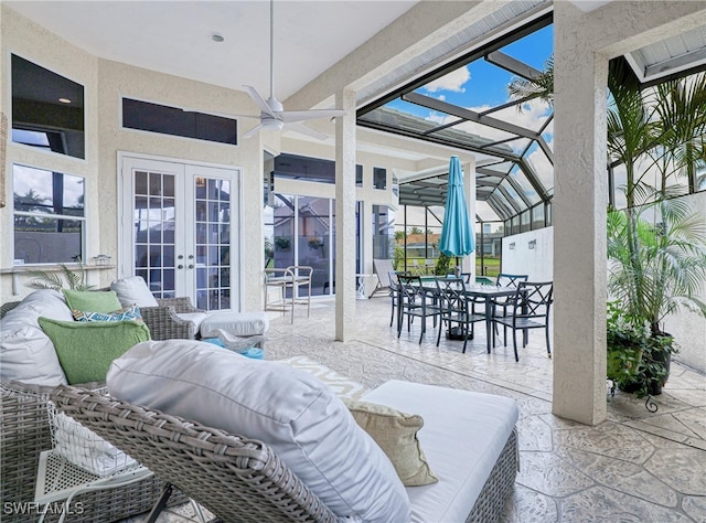 28839 Winthrop Cir, Bonita Springs, FL 34134 - view of patio / terrace featuring french doors, an outdoor living space, outdoor dining space, glass enclosure, and ceiling fan