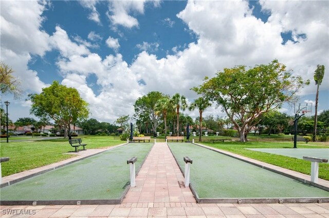 3045 Driftwood Way Unit 3707, Naples, FL 34109 - view of property's community with a bocce ball area and a yard