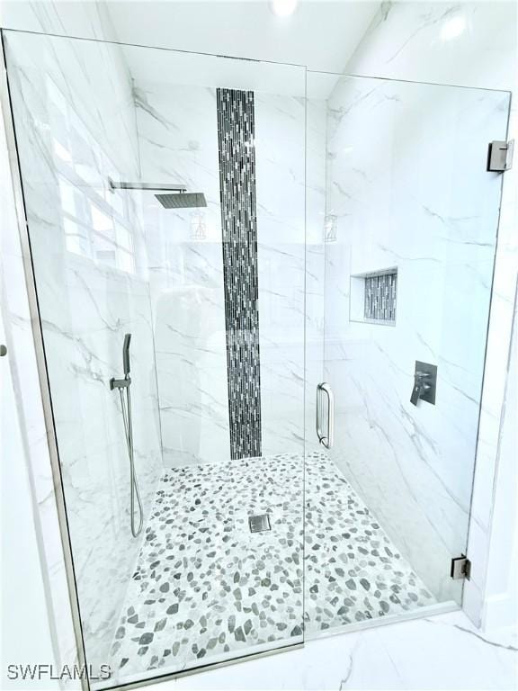 1312 Oak Ave, Lehigh Acres, FL 33972 - bathroom with a marble finish shower and marble finish flooring