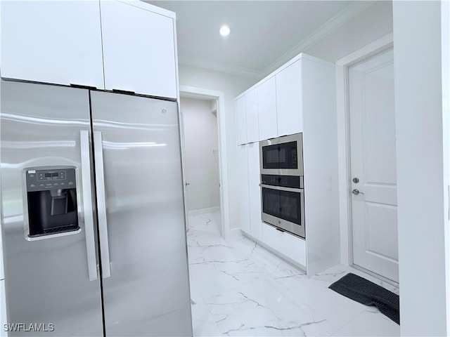 1312 Oak Ave, Lehigh Acres, FL 33972 - kitchen featuring stainless steel appliances, white cabinetry, light marble finish floors, ornamental molding, and recessed lighting