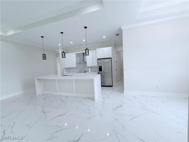 1312 Oak Ave, Lehigh Acres, FL 33972 - kitchen featuring stainless steel fridge, a sink, ornamental molding, white cabinetry, and baseboards
