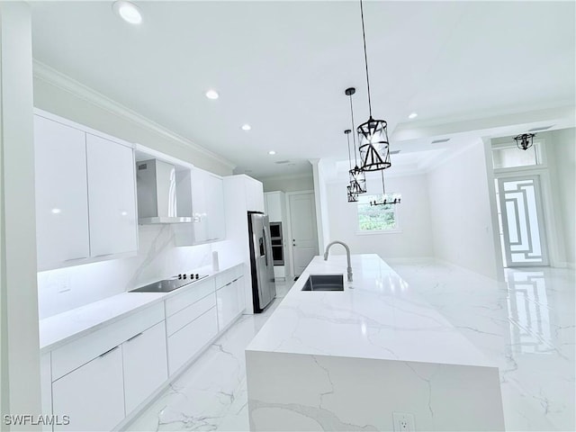 1312 Oak Ave, Lehigh Acres, FL 33972 - kitchen featuring wall chimney exhaust hood, a sink, modern cabinets, a large island, and recessed lighting
