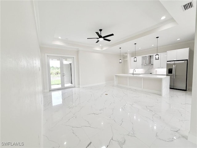 1312 Oak Ave, Lehigh Acres, FL 33972 - unfurnished living room with a tray ceiling, light marble finish flooring, french doors, baseboards, and ceiling fan
