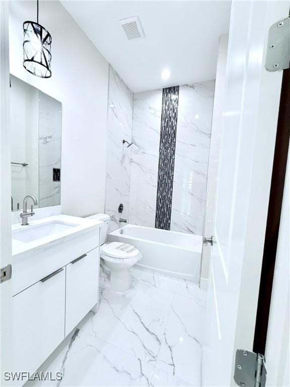 1312 Oak Ave, Lehigh Acres, FL 33972 - full bathroom with marble look tile flooring, vanity, toilet, shower / bathtub combination, and recessed lighting