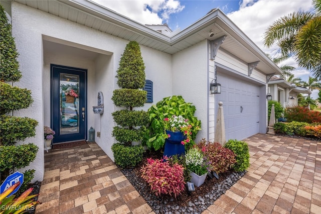 28268 Seasons Tide Ave, Bonita Springs, FL 34135 - property entrance featuring stucco siding and a garage