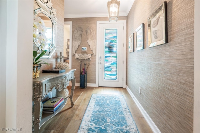 28268 Seasons Tide Ave, Bonita Springs, FL 34135 - entryway with light wood-style floors and crown molding
