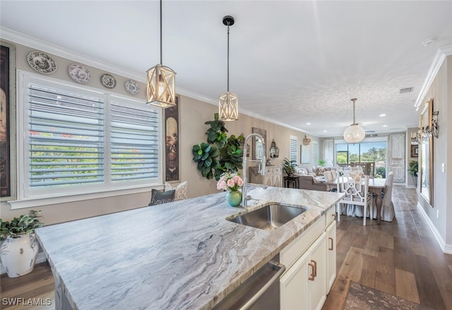 28268 Seasons Tide Ave, Bonita Springs, FL 34135 - kitchen featuring dark wood-type flooring, light stone counters, crown molding, white cabinets, and hanging light fixtures