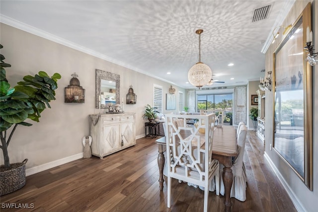 28268 Seasons Tide Ave, Bonita Springs, FL 34135 - dining space with a chandelier, dark wood finished floors, recessed lighting, and crown molding
