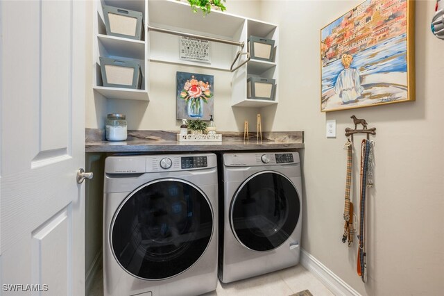 28268 Seasons Tide Ave, Bonita Springs, FL 34135 - laundry room with washer and dryer and light tile patterned flooring